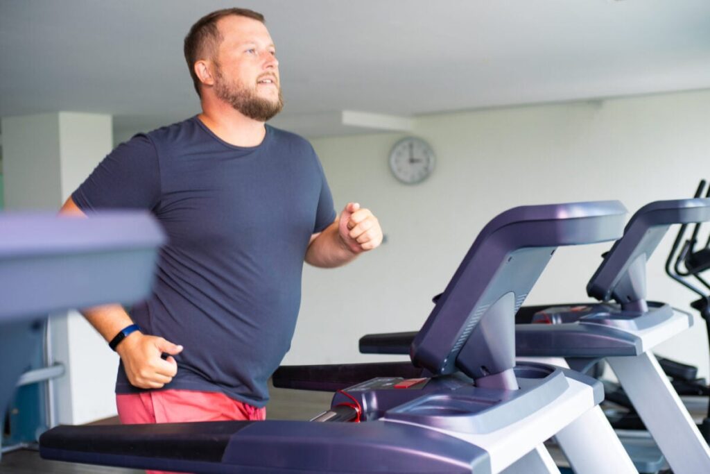A man jogging on a treadmill