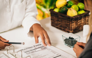 A doctor reviewing nutrition information with a patient